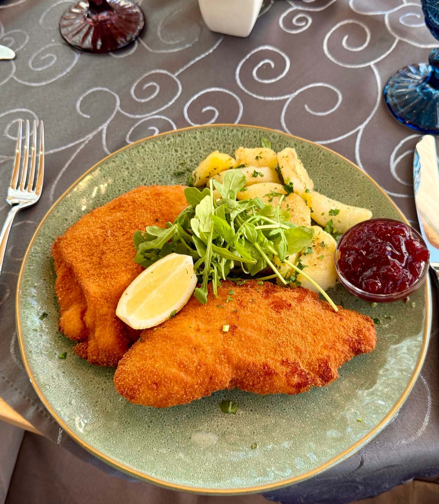 Golden Cordon bleu with roast potatoes and cranberries at Zentrum Café Restaurant