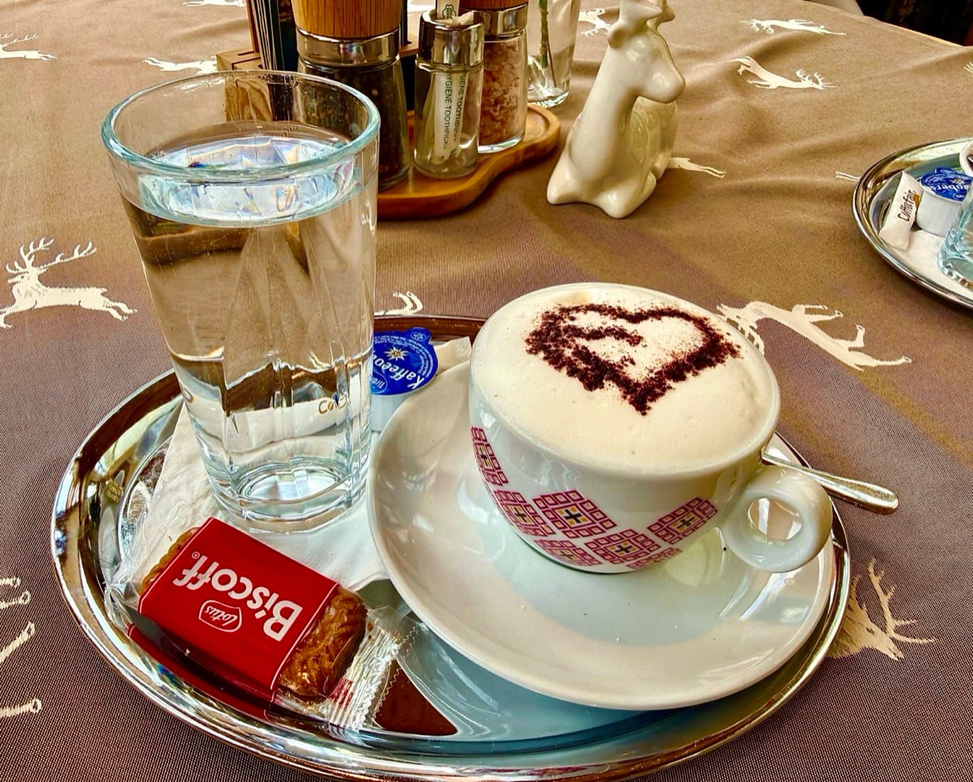 Freshly brewed cappuccino with delicate latte art (placeholder image)